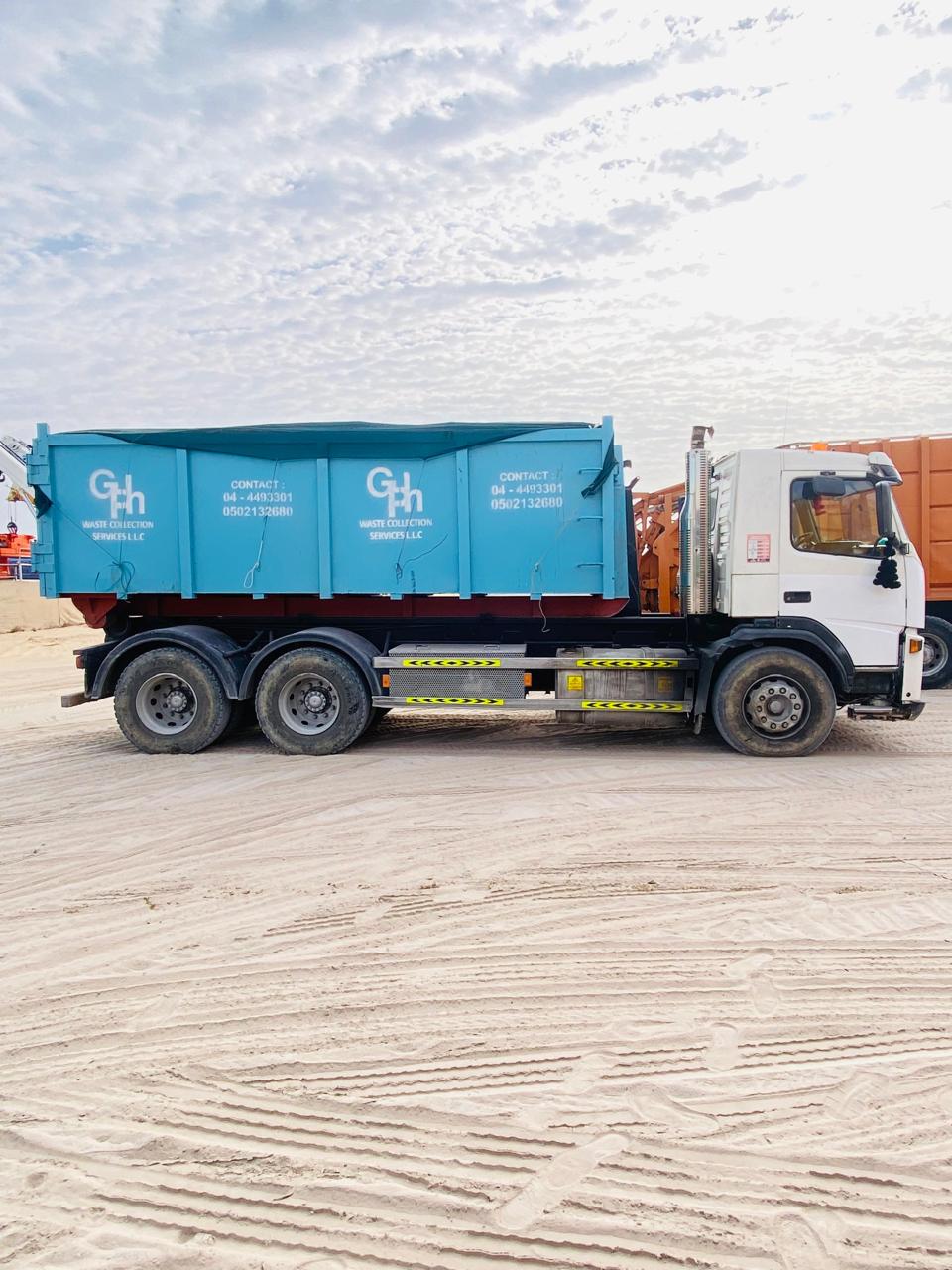 GPh waste truck with full skip ready for collection