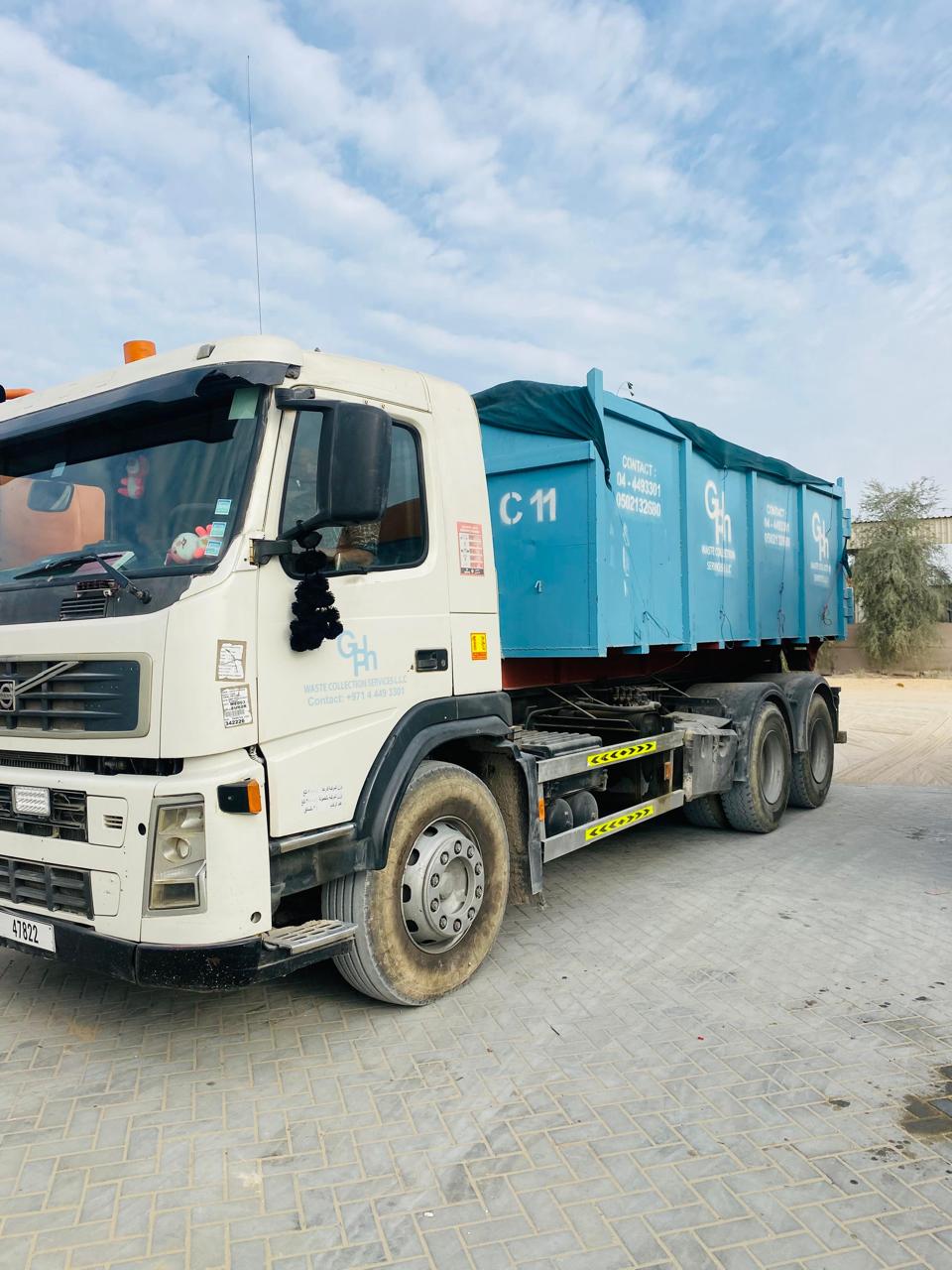 GPh hook loader truck with skip container in Dubai